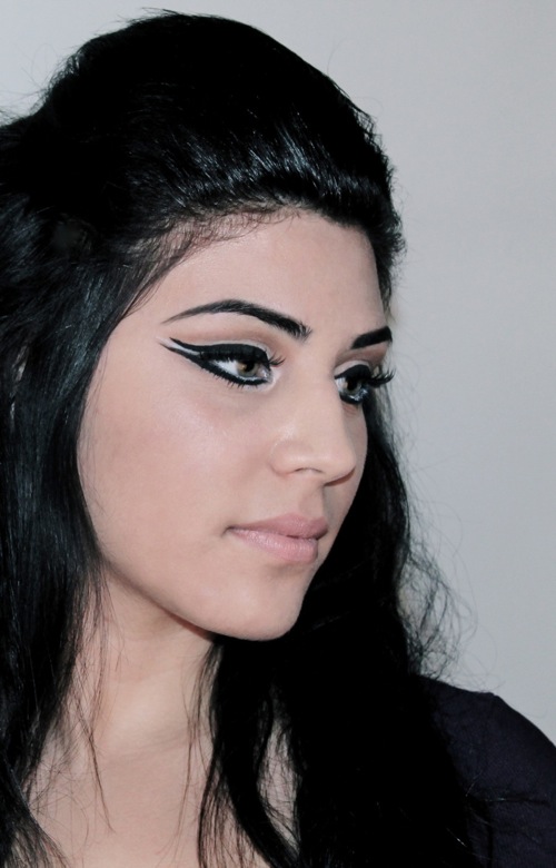 Female model photo shoot of Ekka makeup
