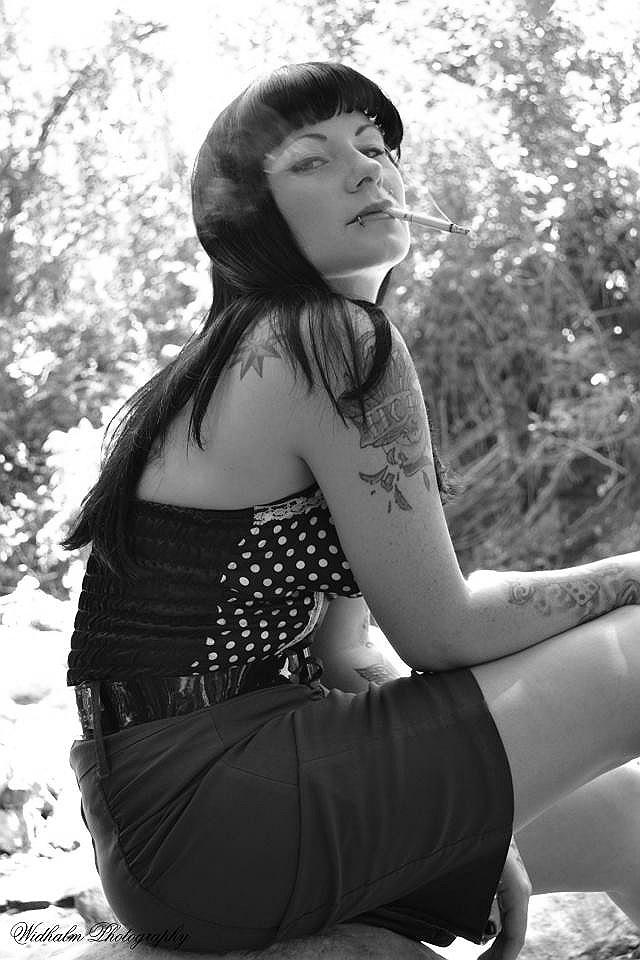 Female model photo shoot of Delightful Domino