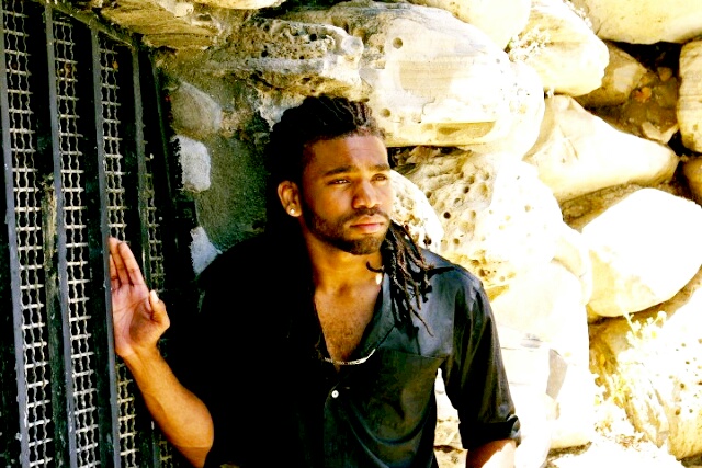 Male model photo shoot of Taurion Wett in mountain cage