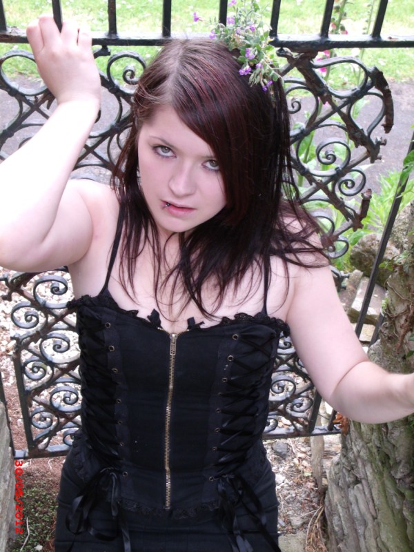 Female model photo shoot of sadistic vengance in church