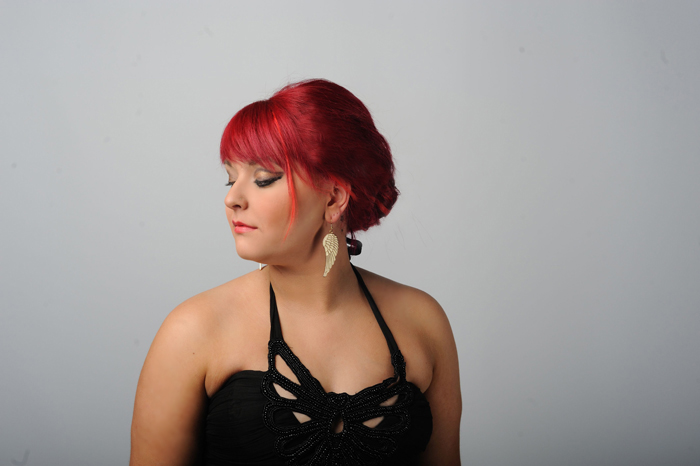Female model photo shoot of MiaBellaHairBeauty in Pictage Studios