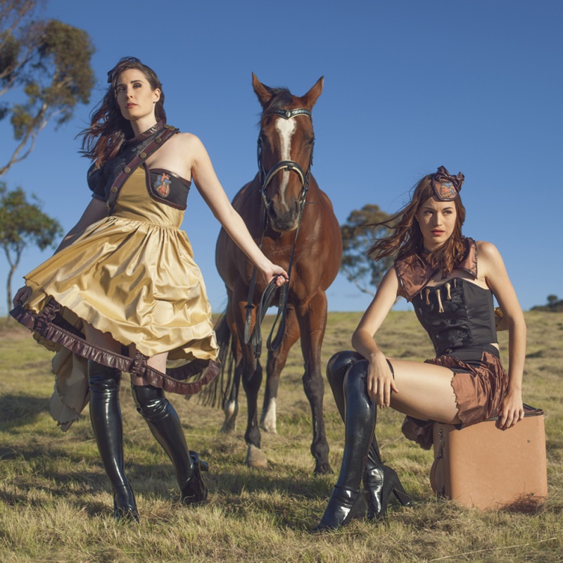 Female model photo shoot of Angeline Bubsy and Amelia Van by Sammy Harrison, clothing designed by Devaki Black