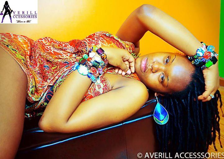 Female model photo shoot of IImanII , clothing designed by Averill Accessories 