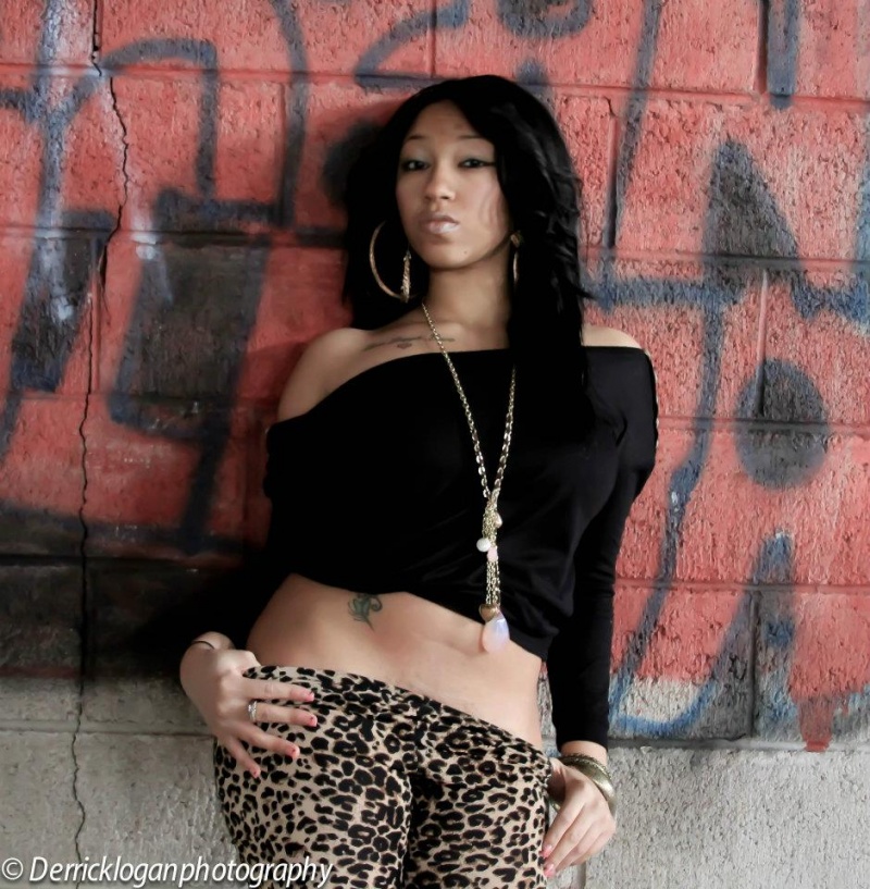 Female model photo shoot of La Tasha Antoinette by DerrickLoganPhotography