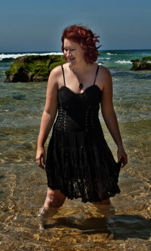 Female model photo shoot of Elindor in Nobbies Beach, Newcastle
