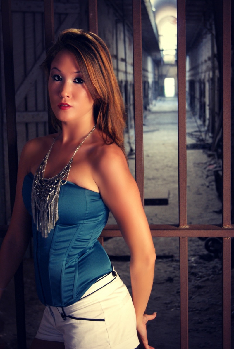 Female model photo shoot of Laura Gore in Eastern State Penitentiary
