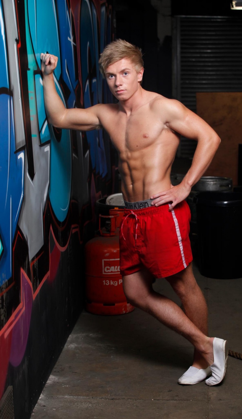 Male model photo shoot of Dann Lewis by Camera One UK in Warehouse gym