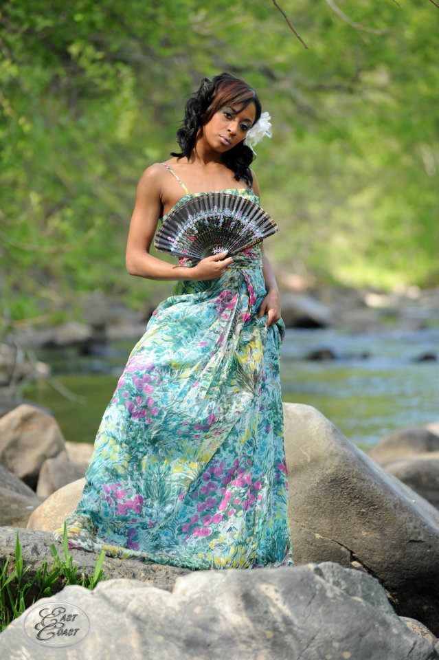 Female model photo shoot of Joyfully  in by the rocks/water showing my hispanic side