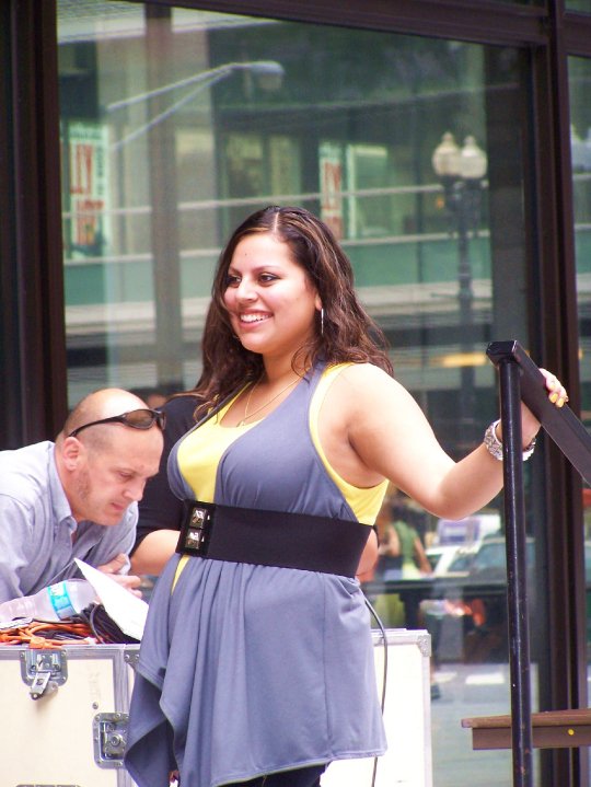 Female model photo shoot of Ashley Orendorff in daley Plaza, Chicago, IL.