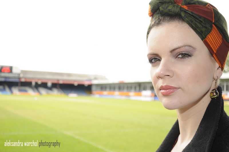Female model photo shoot of evdokia in Luton football club