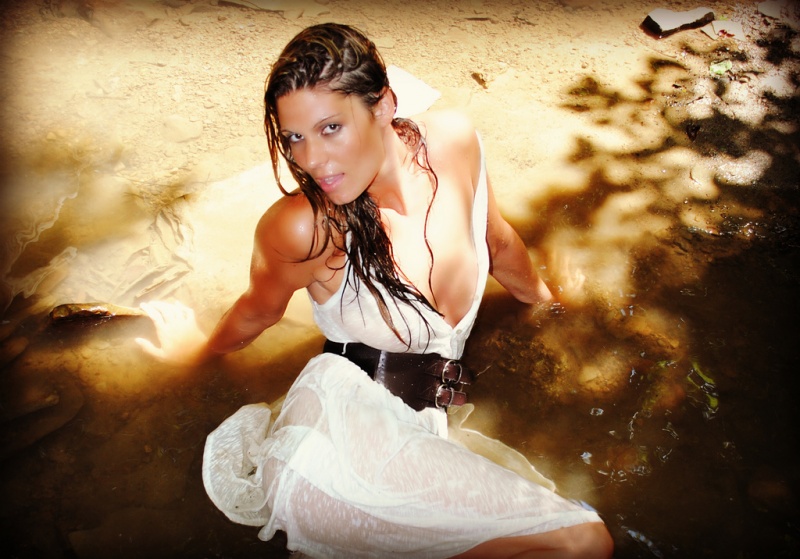 Female model photo shoot of A C Face by BlkAplStudios in A RIver Somewhere