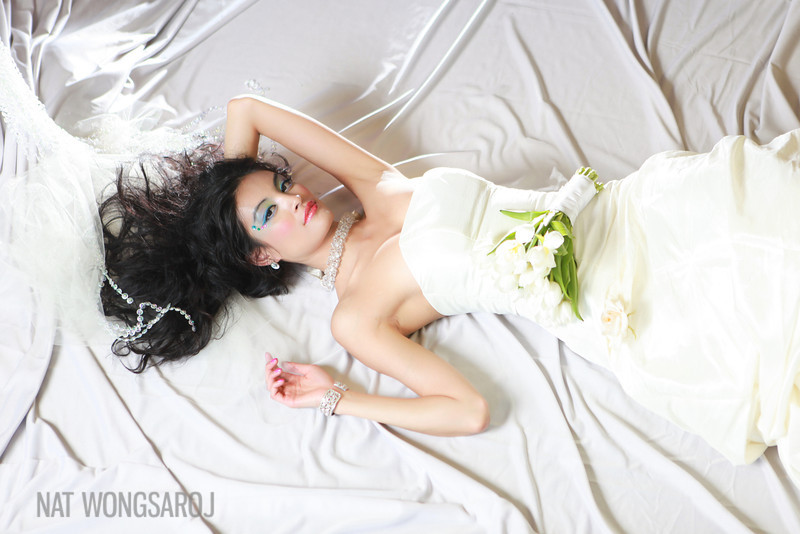 Female model photo shoot of larissanorrismakeup by Nat Wongsaroj in Quest Drape