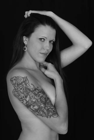 Female model photo shoot of green eyed coquette by AdVanced Photography