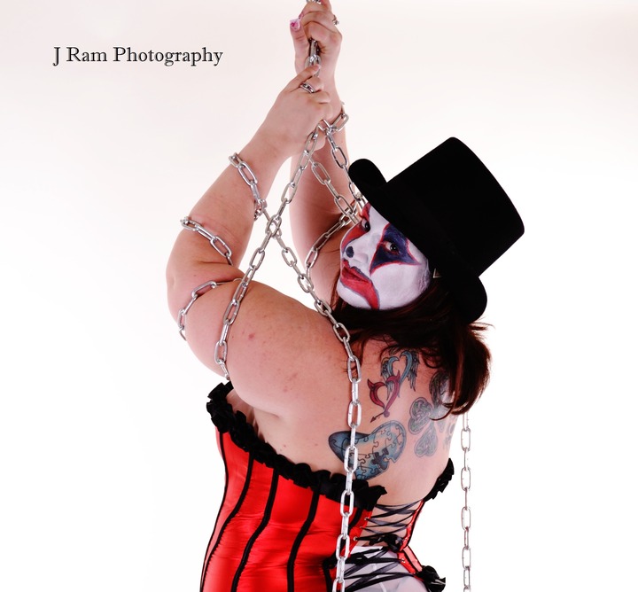 Female model photo shoot of Dollsfire  by J Ram photography in Austin,TX, makeup by rotten world