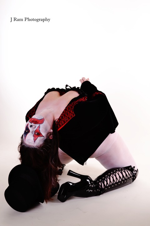 Female model photo shoot of Dollsfire  by J Ram photography in Austin,TX, makeup by rotten world