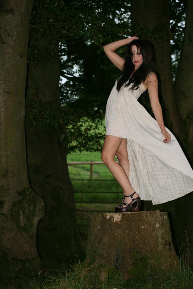 Female model photo shoot of Zara York in a field in somerset
