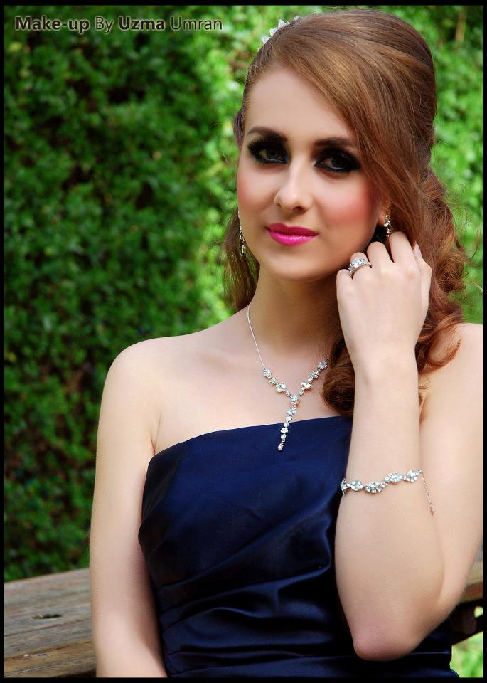 Female model photo shoot of Uzma Umran Mua