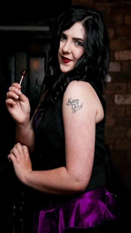 Female model photo shoot of LauraSinclair in Plus48 Tattoo Studio, Leith Walk.