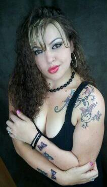 Female model photo shoot of Tattooed_Butterfly