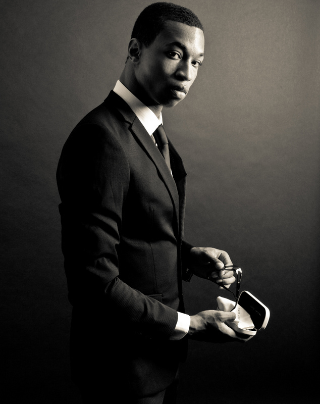 Male model photo shoot of Ricardo Tee by Ade Akinyede