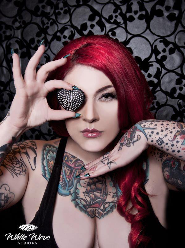 Female model photo shoot of Dallas Valentine in Vancouve Tattoo Convention