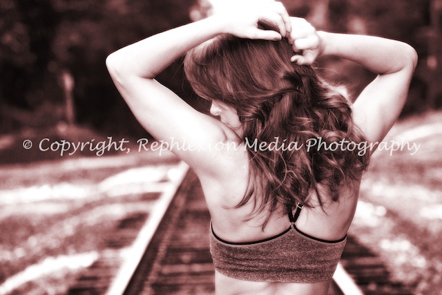 Female model photo shoot of Rephlexion Photography and Kaycee Ann in Train Tracks-NC