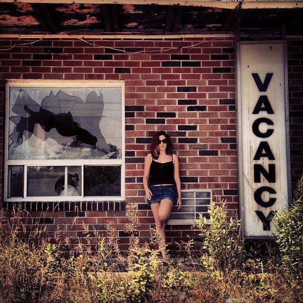 Female model photo shoot of Jennifer Cupcakes in Abandoned Motel