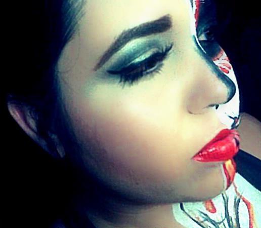 Female model photo shoot of  Makeup by Jezikahh