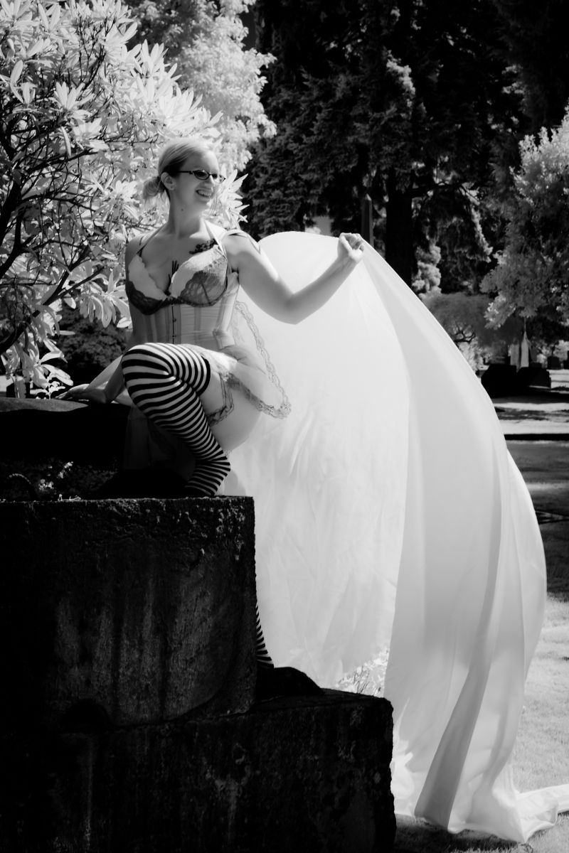 Female model photo shoot of LiketNoire by naimages in Lakeview Cemetery, Seattle, WA