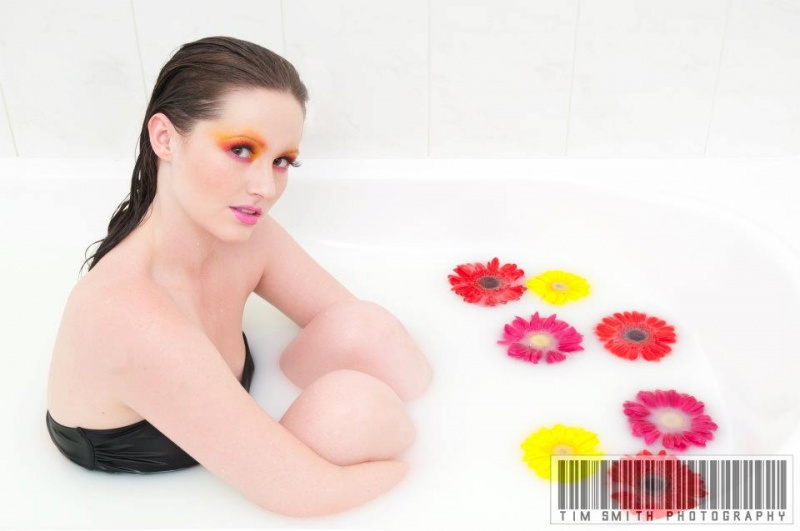 Female model photo shoot of Naomi Capper in Bathtub
