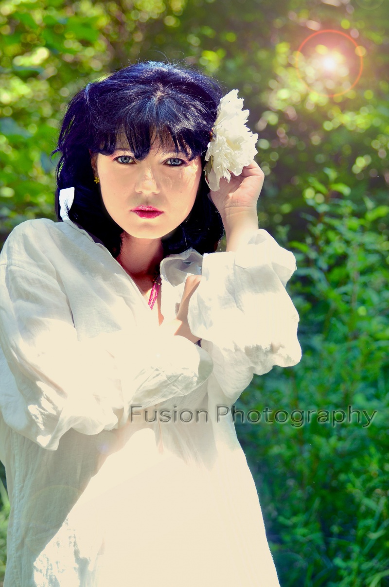 Female model photo shoot of FusionPhotography LLC in Fusion Photography Studio
