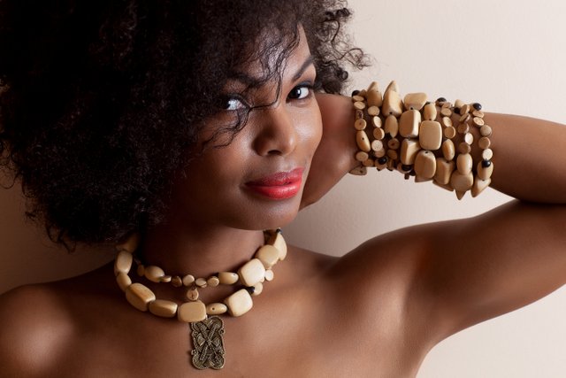 Female model photo shoot of Nzingah by Black Girls Rule