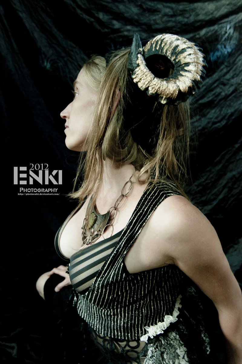 Female model photo shoot of Emiry by Enki Photography
