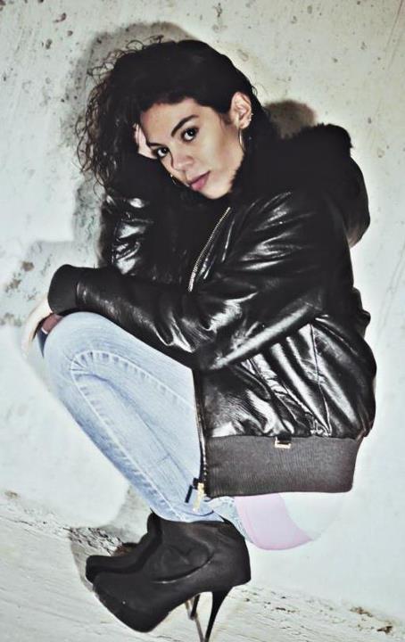 Female model photo shoot of Ally Lovely in underground parking lot, hamilton ontario