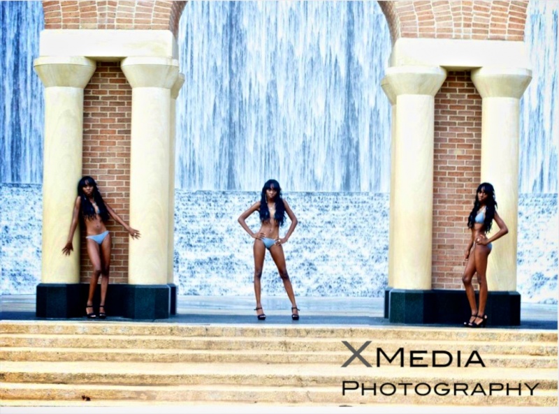 Female model photo shoot of Symone N Williams in Houston Tx Galleria Waterfall