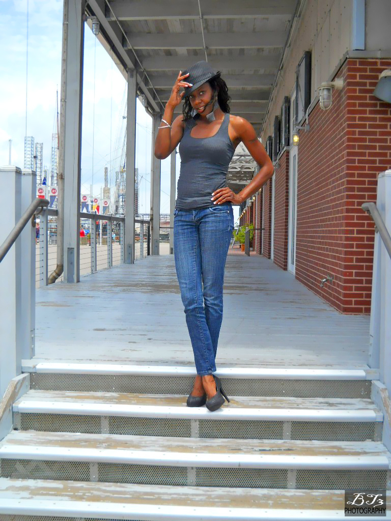 Female model photo shoot of HS Slim in Galveston Bay Harbor, Galveston Island, TX