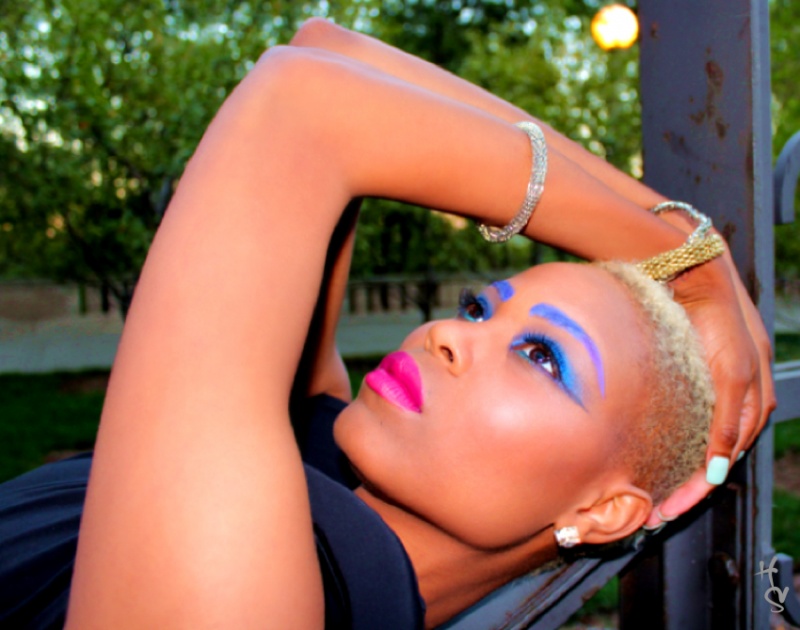 Female model photo shoot of Aretha Renee MUA by K NiCole Photography in Millenium Park Chicago