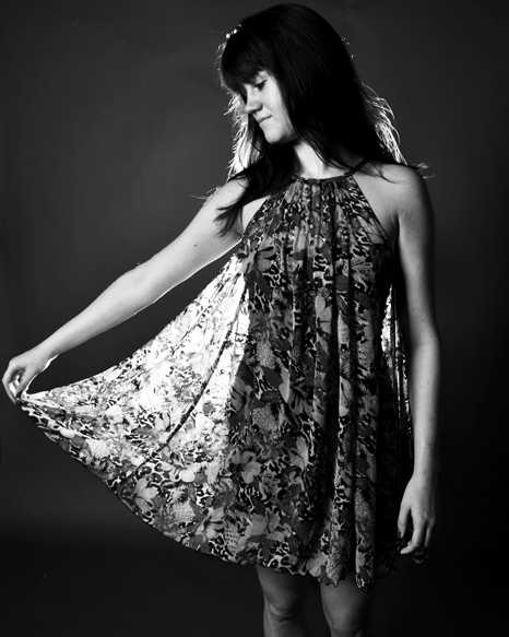 Female model photo shoot of Pretium-Photography in Studio