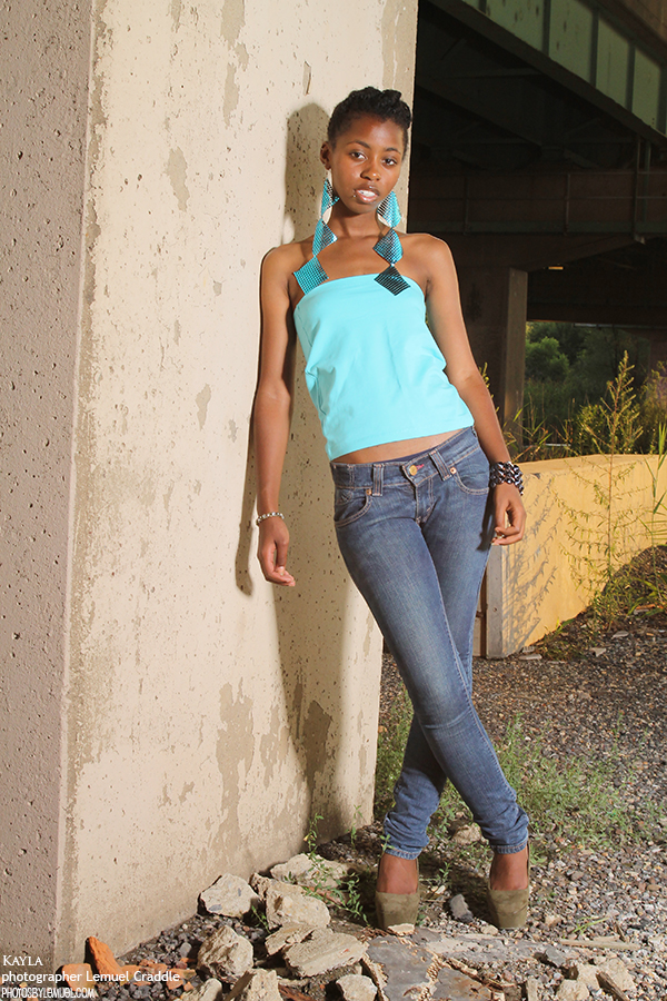 Female model photo shoot of Kayla Bryant by Photos by Lemuel in Under a bridge