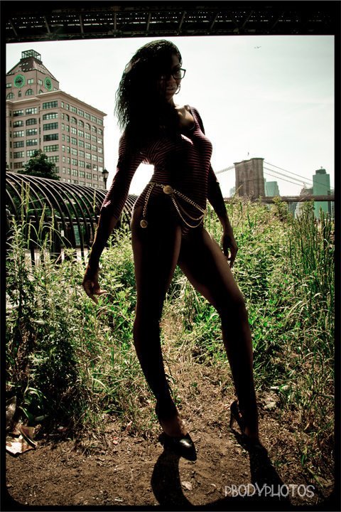 Female model photo shoot of Chelsea WiseWoods in Under the Brooklyn Bridge