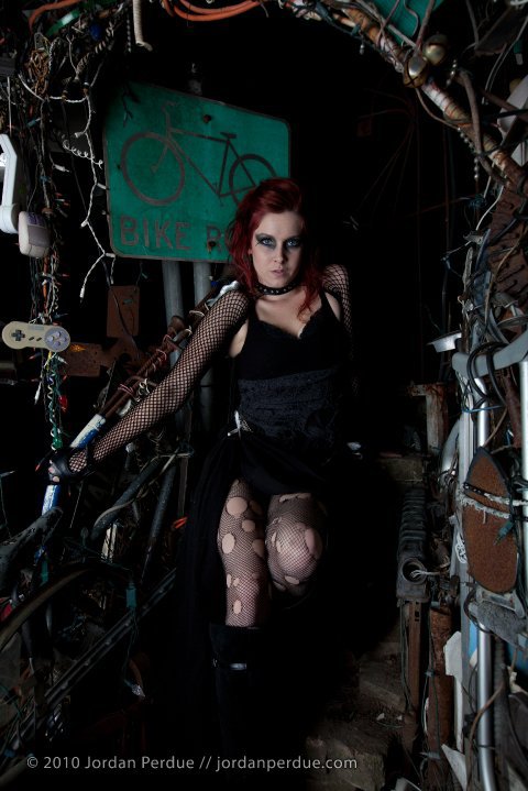 Female model photo shoot of LyssaLectro in Cathedral of Junk, Austin, Tx