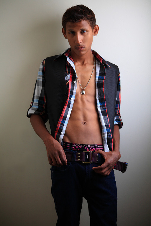 Male model photo shoot of papito Ramirez by MarquezPhotography