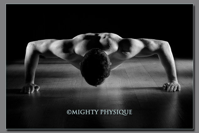 Male model photo shoot of Mighty Aphrodite in Mighty Physique Studio