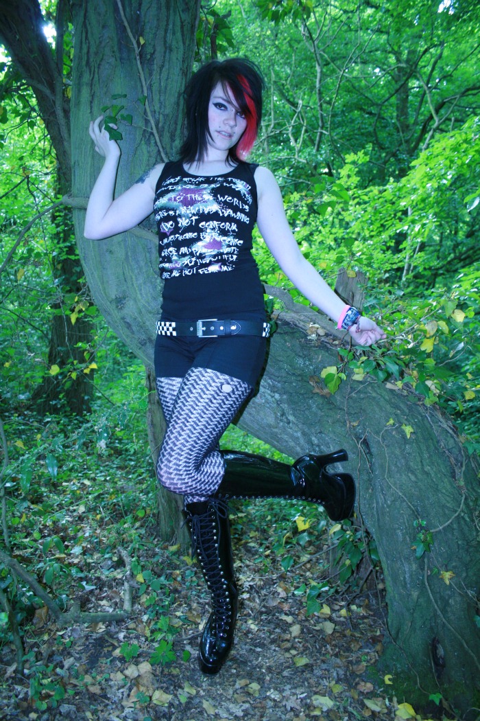 Female model photo shoot of miss kitty valentine in woods