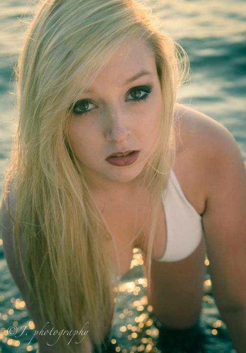 Female model photo shoot of Nicole Roy in Kits beach