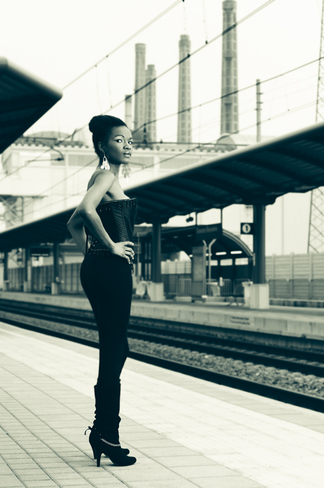 Female model photo shoot of Karen Silva in Cesano Boscone train station.