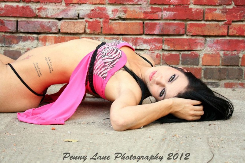 Female model photo shoot of Penny Lane Photography