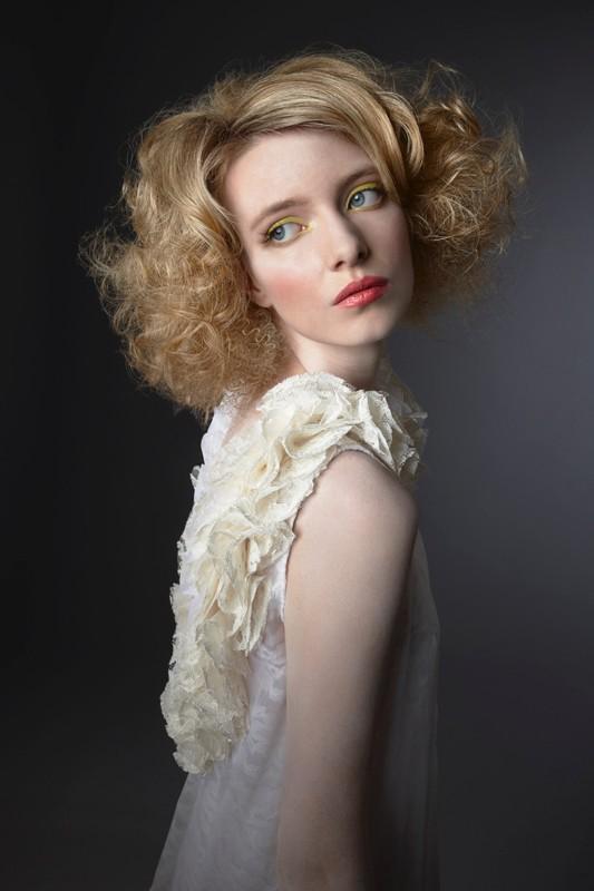 Female model photo shoot of kira pinski hairstylist