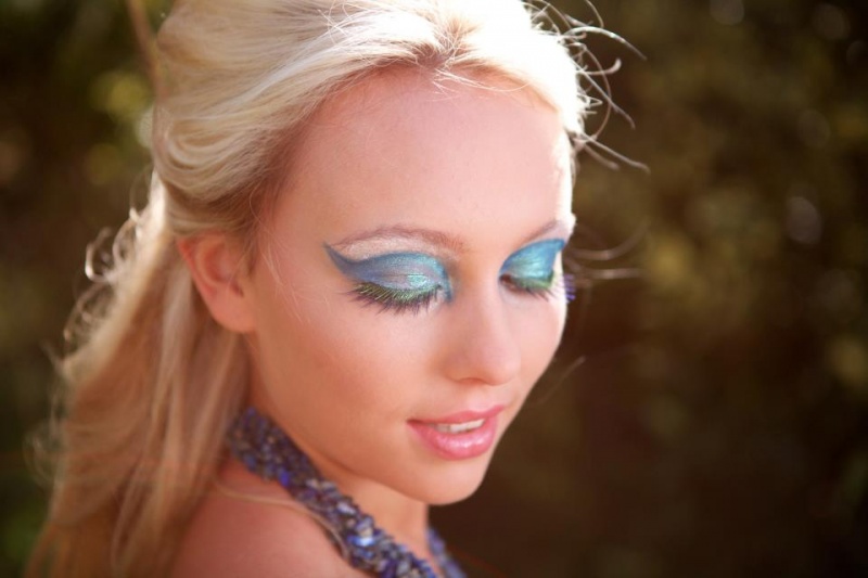 Female model photo shoot of Emma Mack Makeup