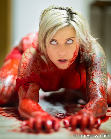 Female model photo shoot of Rita Worth by strobeglow in hell